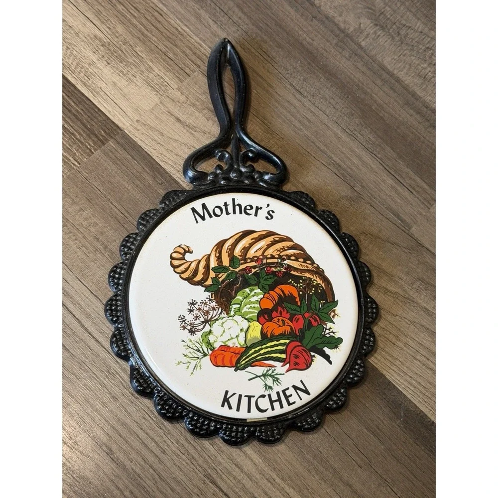 Vintage Mother's Kitchen Black And Ceramic Trivet. With A Cornucopia Design